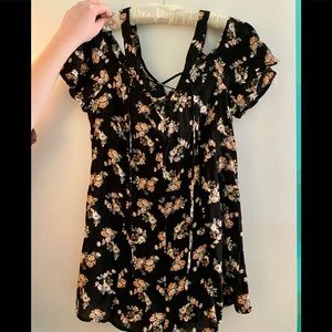 New with tags, cute black floral romper.